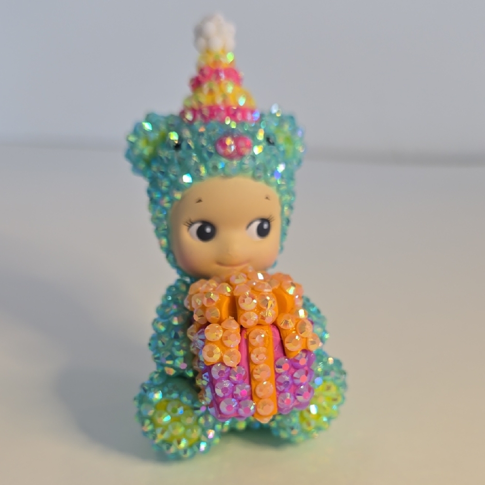 Sparkly Teal Sequin Baby Figurine Holding Gift - Kids Toys